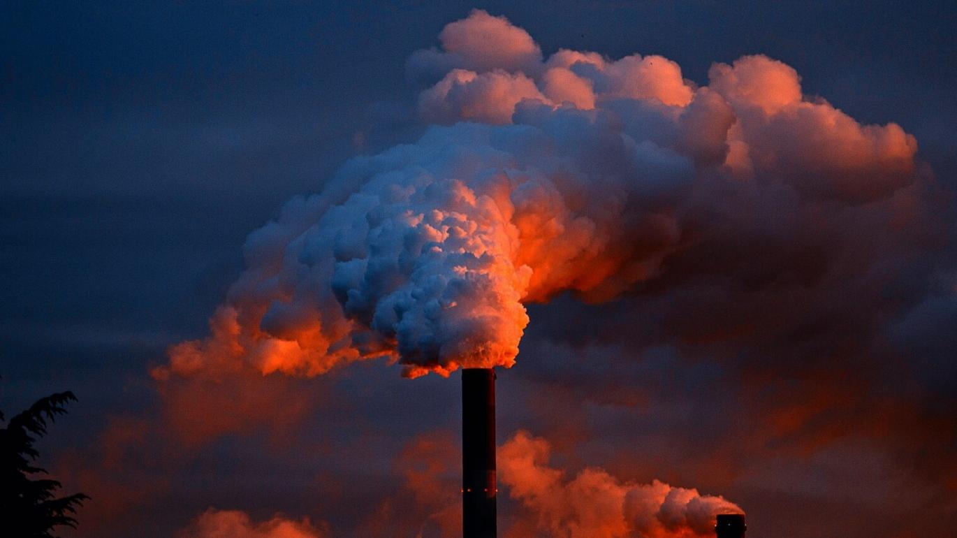 Smokestack with billowing smoke