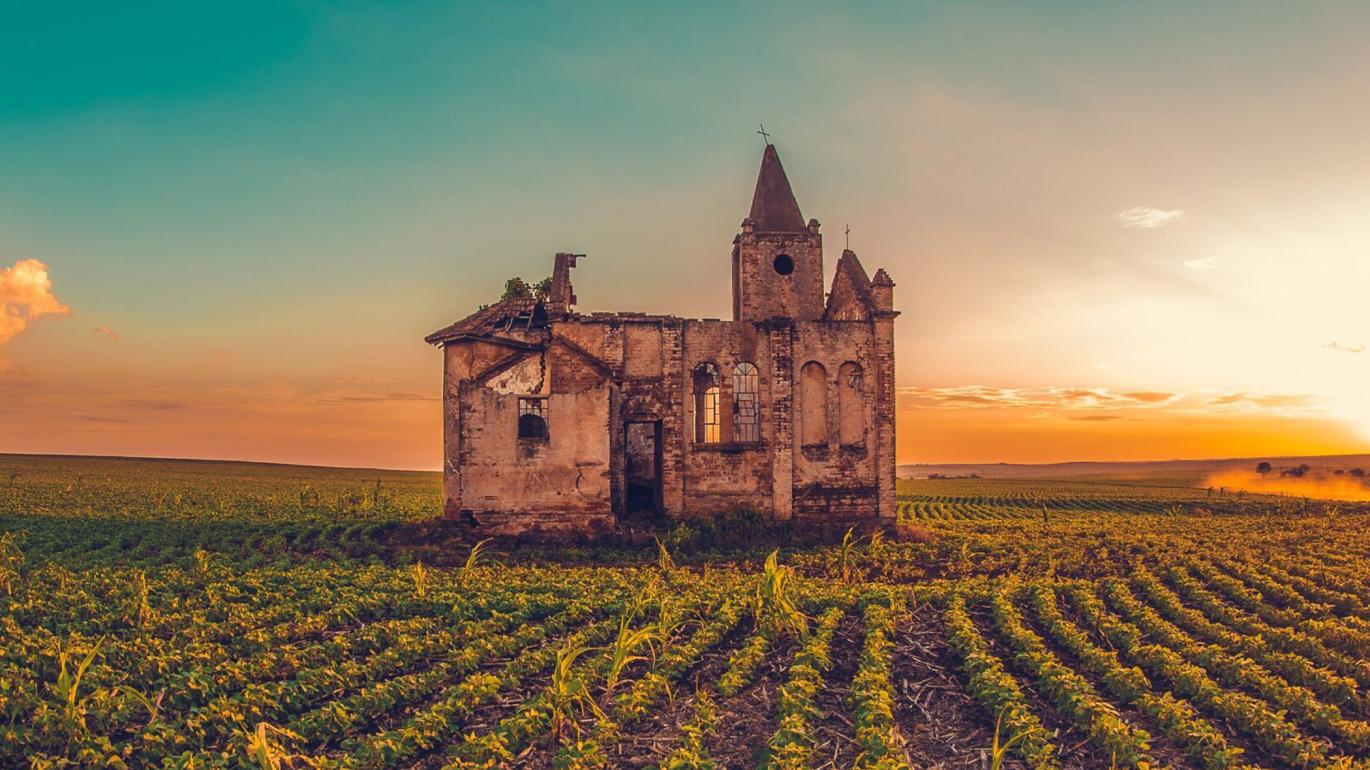 Ruined church in a field