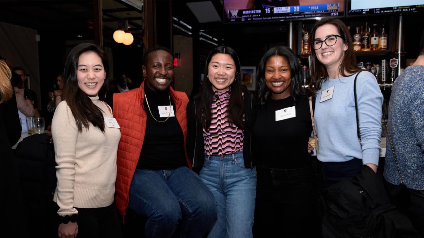 People at an alumni event