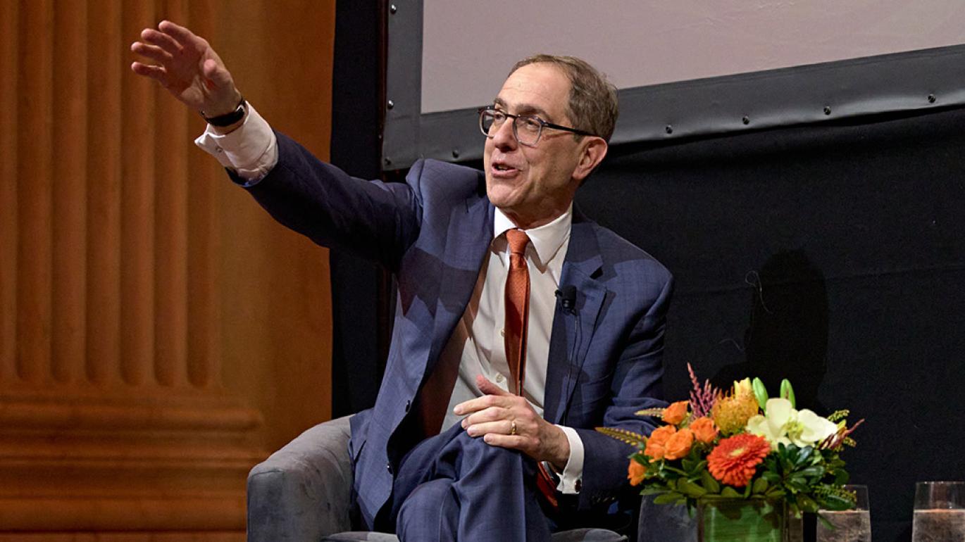 President Eisgruber motions to the audience during one of his Venture Foward conversations.