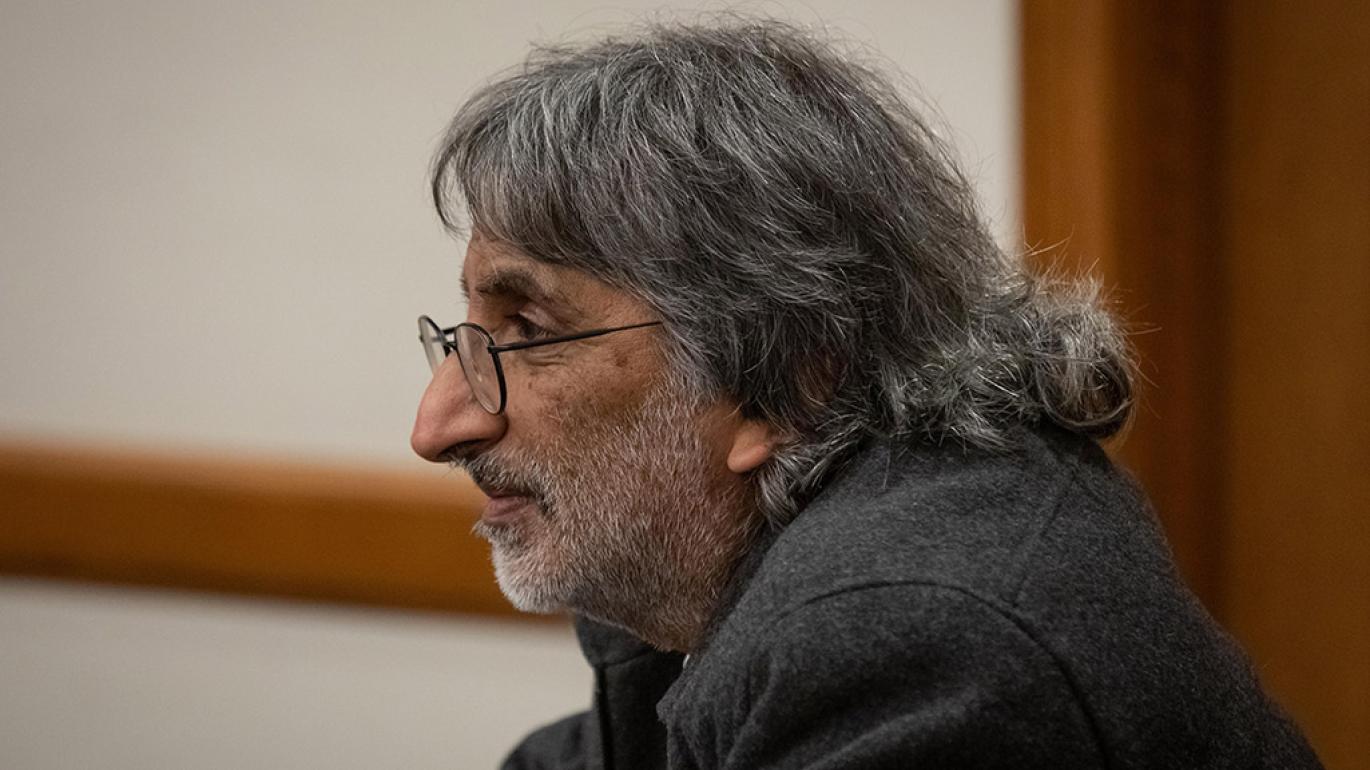 Akhil Reed Amar listening intently during one of his speaking engagements.