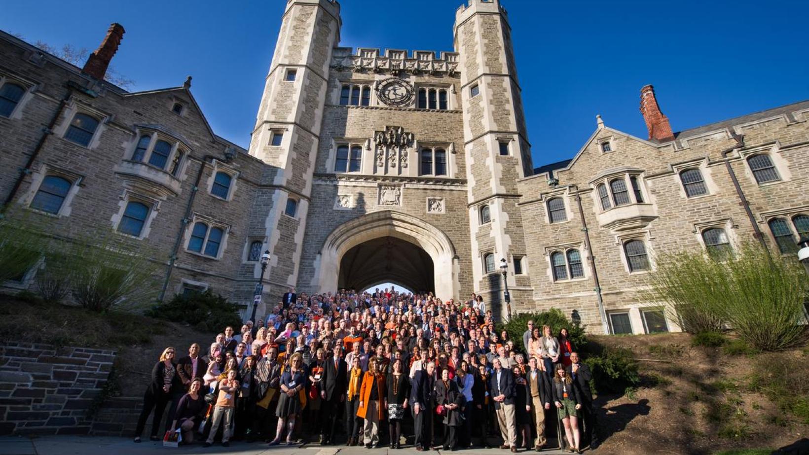 Alumni in front of Blair Arch