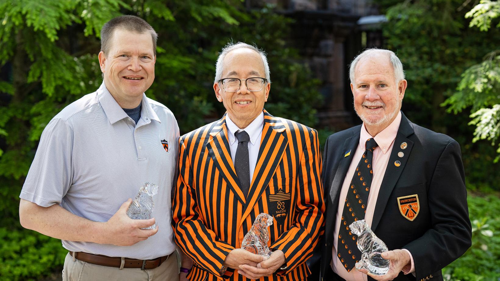 Doug Massick, Doug Chin and Bill Charrier pose with their Awards for Service to Princeton