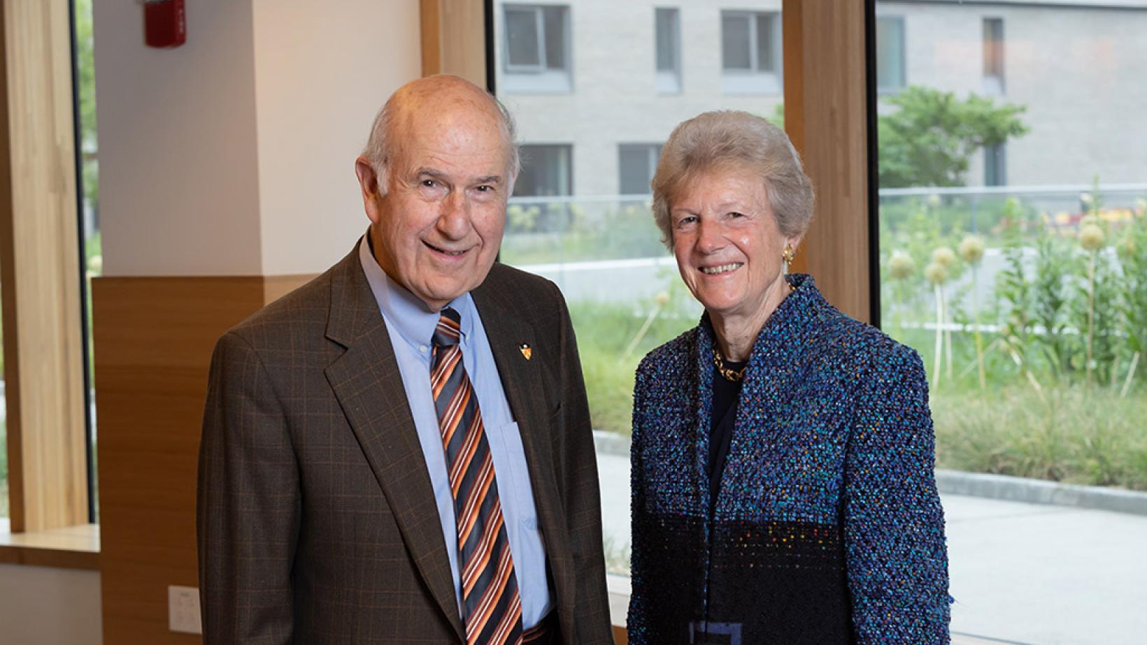 Gilbert Omenn and Martha Darling smiling