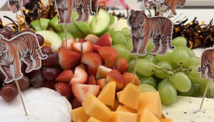 Food from Orange and Black Day party with Tiger toothpicks