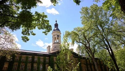 Nassau Hall, with the cuppola framed by blue sky