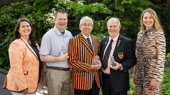 Alumni volunteer leaders pose with this year's Service Award winners