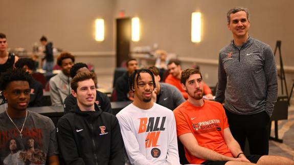 Mitch Henderson and members of the men's basketball team participate in media day at the 2023 NCAA Tournament.