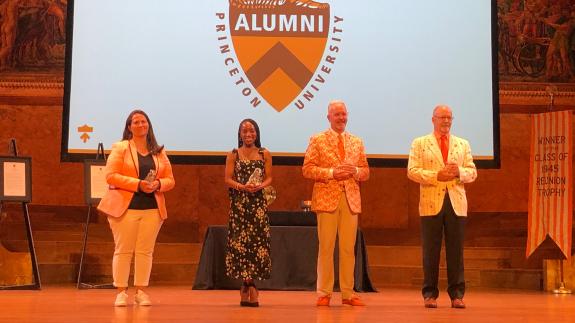 Beverly Random, Erica McGibbon, Robert Gleason and Frederick Strobel accept their service awards in Alexander Hall