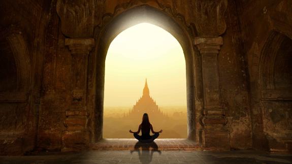 Individual doing yoga in India