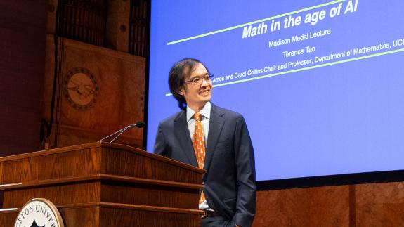 Terence Tao speaking at the podium during Alumni Day