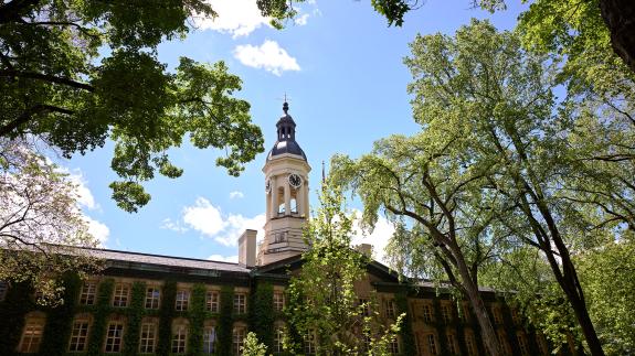 Nassau Hall, with the cuppola framed by blue sky