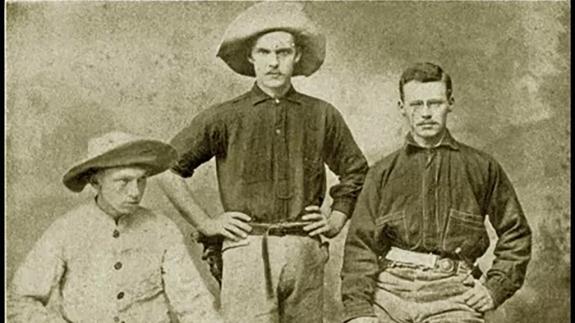 Sepia-toned portrait of three rugged looking men