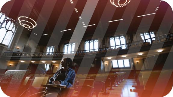 A lone student sitting in McCosh 50