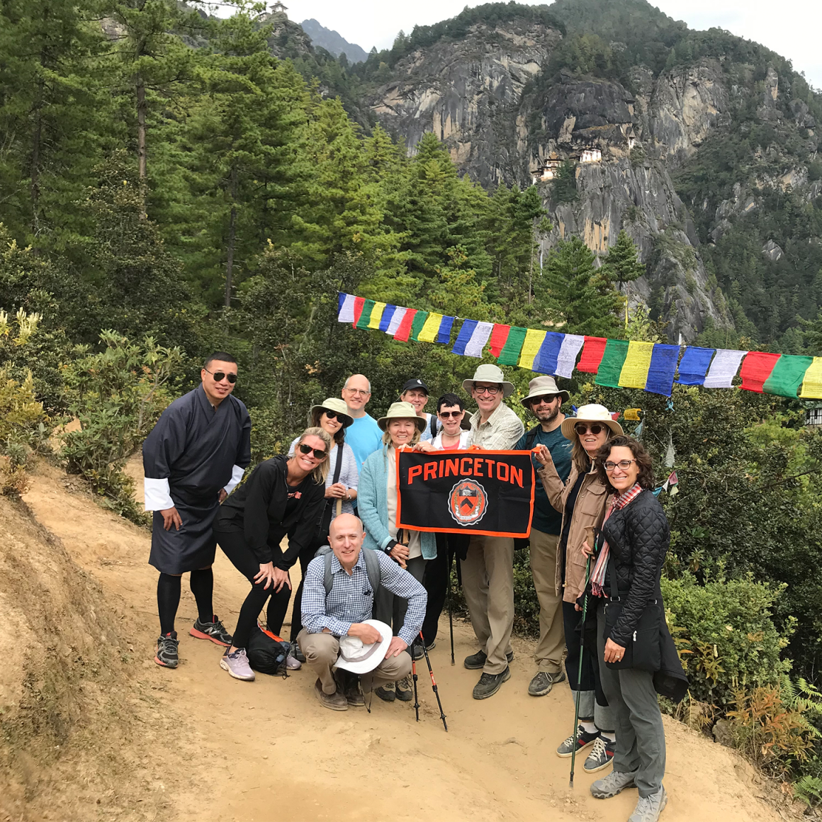 Group of travelers on side of mountain in Bhutan