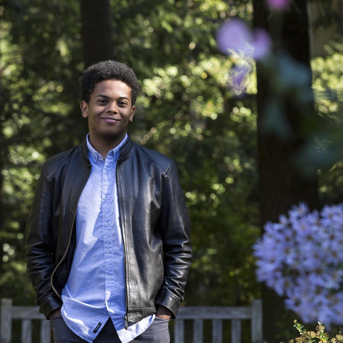 Nathnael Mengiste '22 standing in front of trees on Princeton campus
