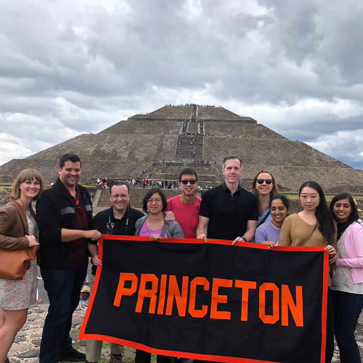 Princeton Journeys travelers holding Princeton banner in Mexico