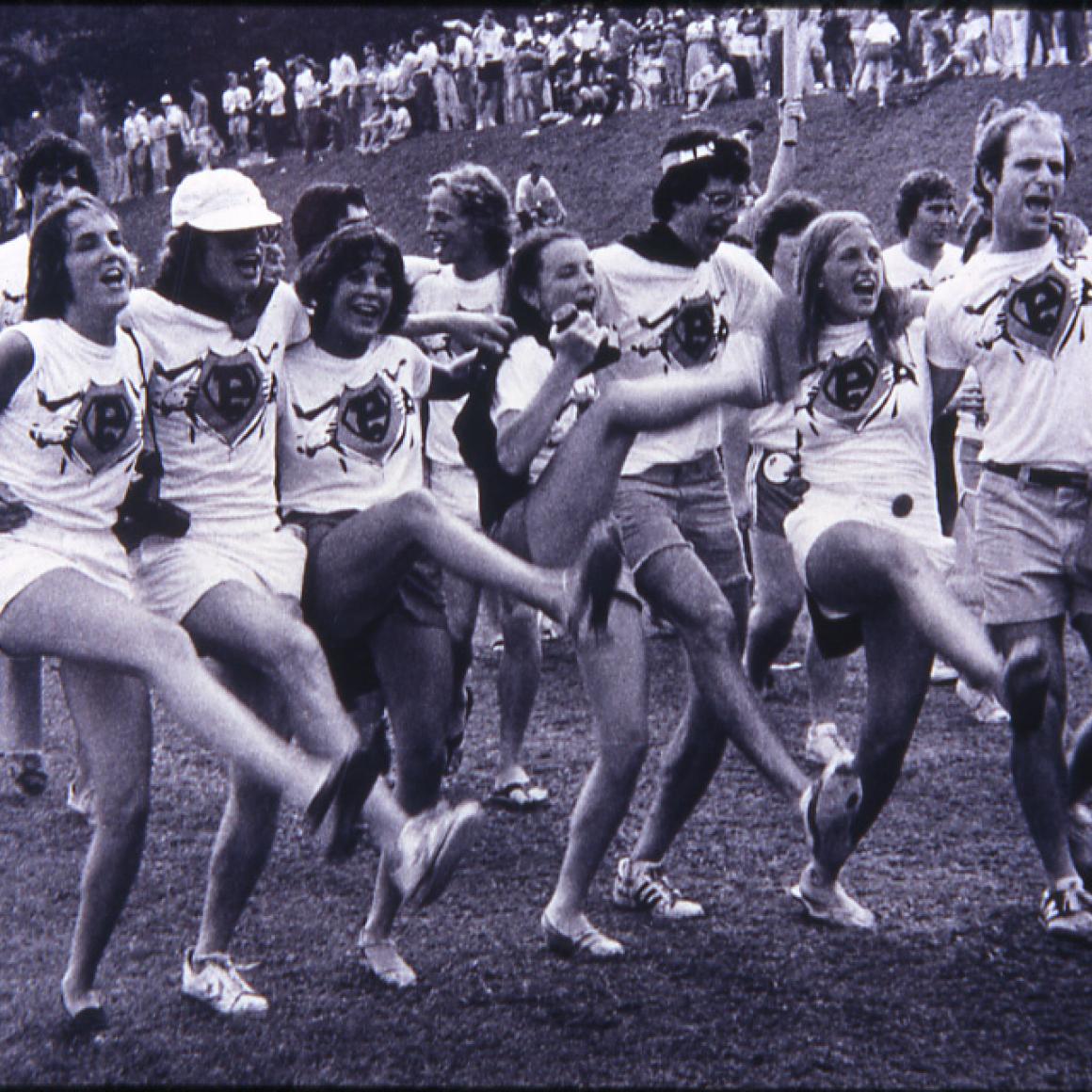 Alumnae doing kickline
