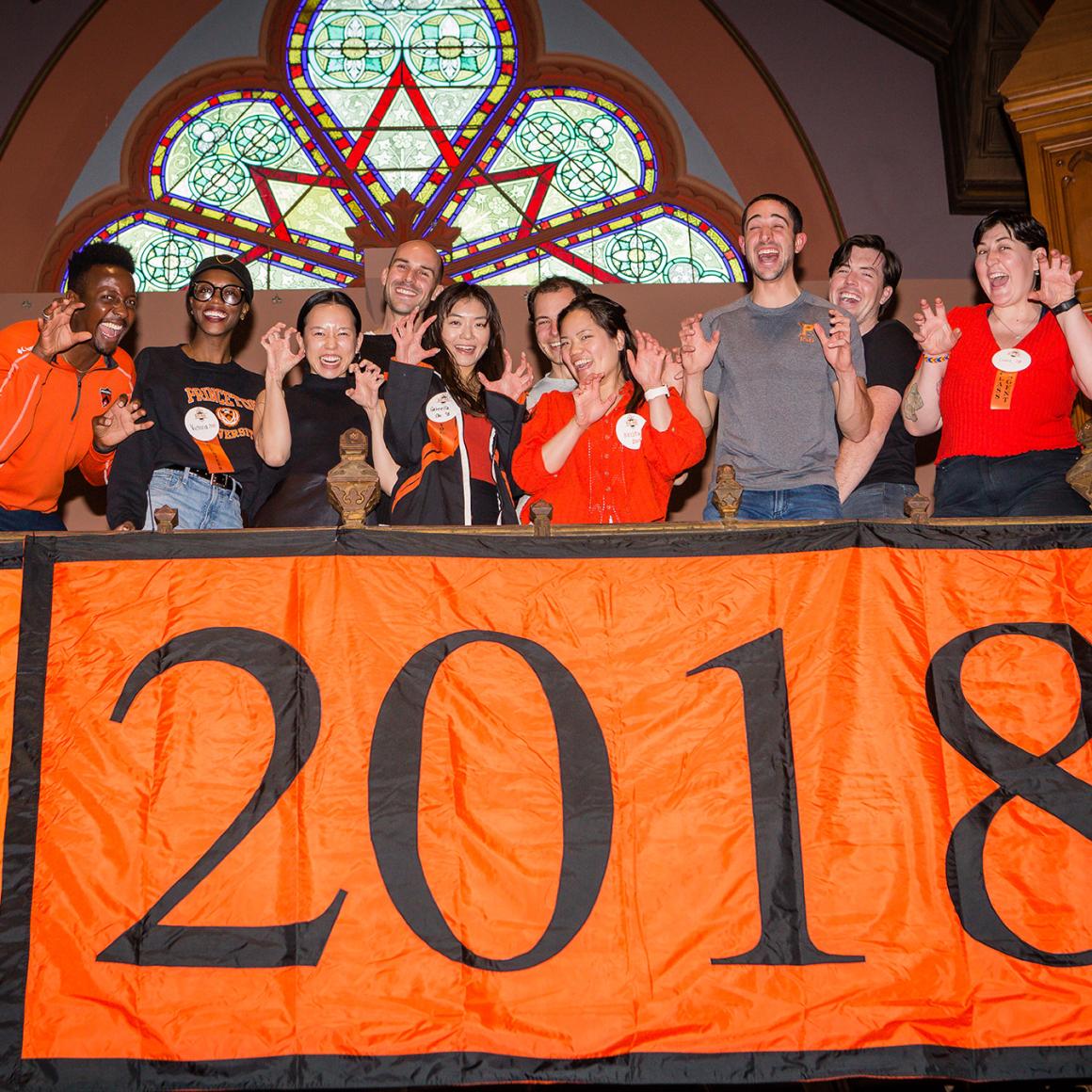 The Class of 2018 celebrates the perfect ROAR.