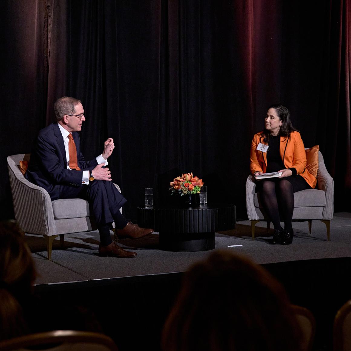 President Eisgruber and Melissa Wu converse on stage during the Boston event.