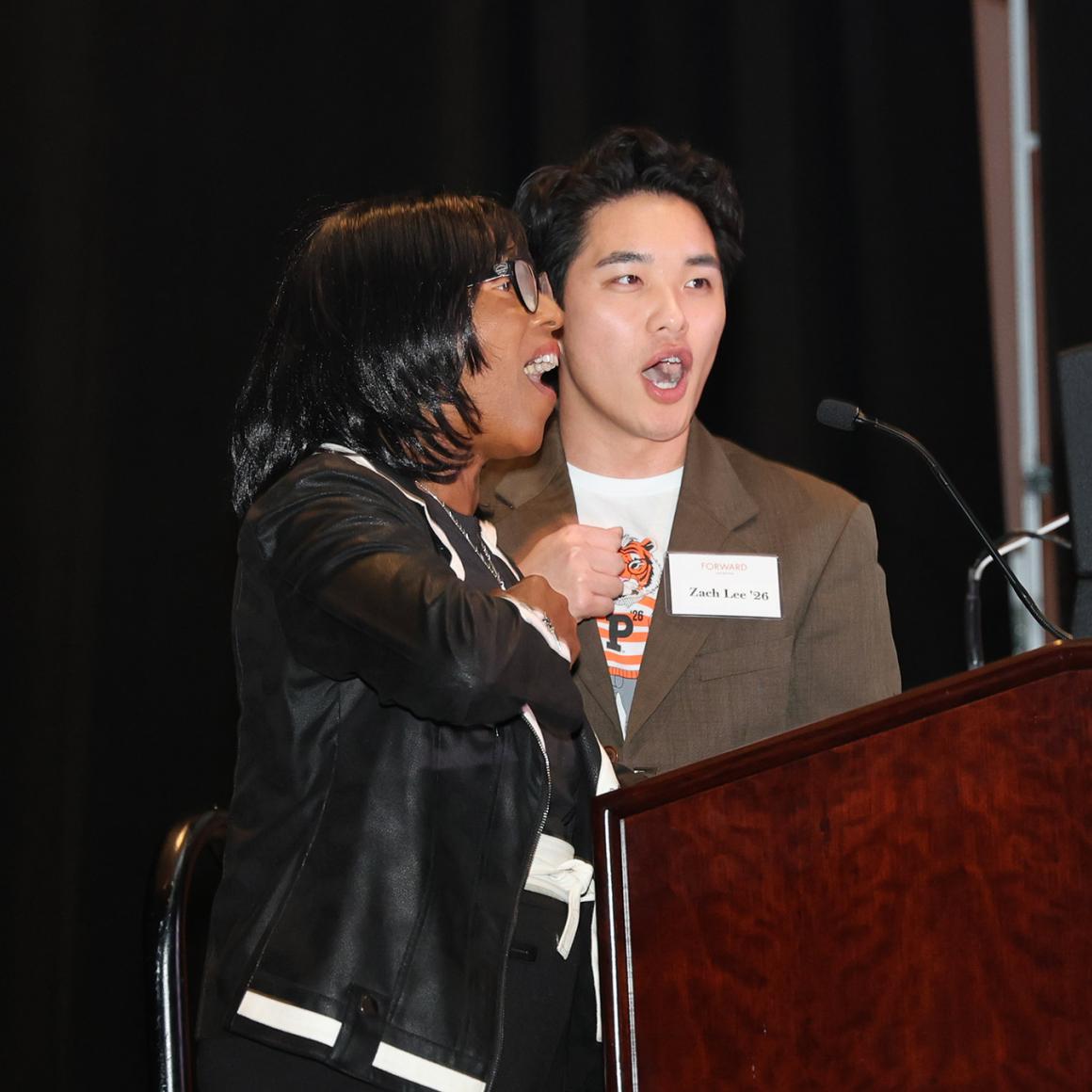 Tina Treadwell ’80 and Zach Lee ’26 singing Old Nassau