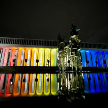 Building lit up in rainbow colors