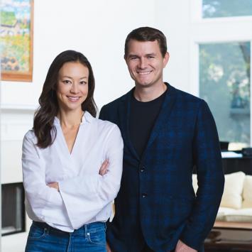 Lisa Tan '01 and Martin Rawls-Meehan '01 standing together