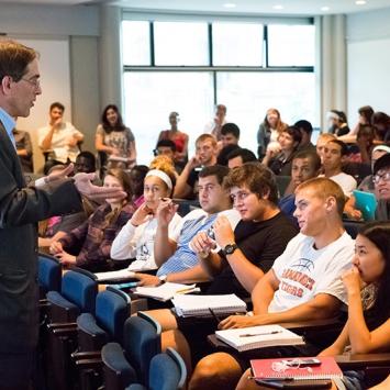 President Christopher L. Eisgruber '83 with FSI students
