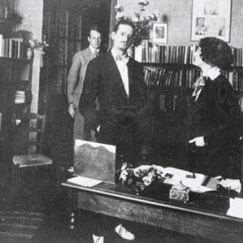 Writers John Rodker and James Joyce with Sylvia Beach at Shakespeare and Company.