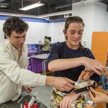 Noah Fishman ’16, Nora Bradley ’18, and Sunny He ’18 designed a device that allows visually impaired people to experience color.