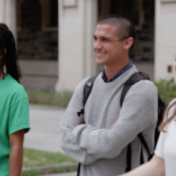 Students and alum walking