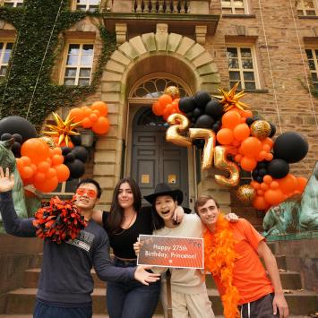 Group photo in front of Nassau Hall during Orange & Black Day