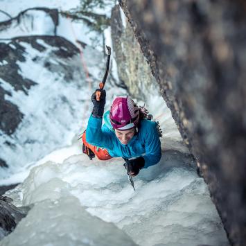 Majka Burhardt scaling an icy cliff
