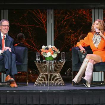 President Eisgruber and Kwanza Jones on stage together in Los Angeles