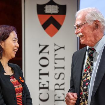 Fei-Fei Li and Johns Fitzpatrick conversing on the stage of Richardson Auditorium