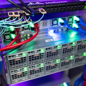 Wires and bright lights that are part of the AI data storage infrastructure