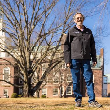 Avi Wigderson, standing near the Institute of Advanced Study