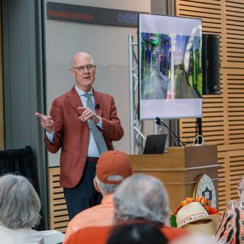University Architect Ronald J. McCoy *80 at a podium 