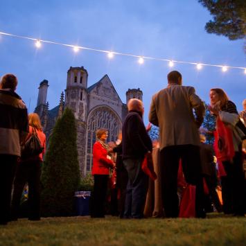 Graduate School alumni mingle near the Graduate School building during the 2013 alumni conference