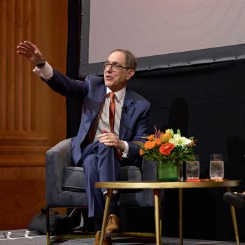 President Eisgruber and Lisa Washington speak on stage at the Franklin Institute.