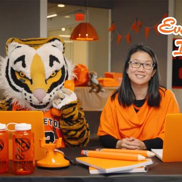 Deb Yu and Tiger working on their laptop computers. 