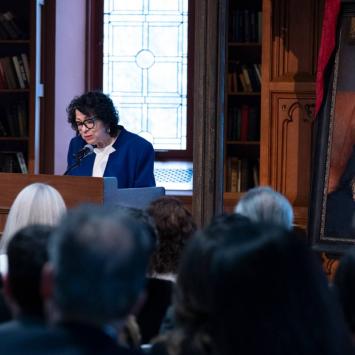 President Christopher L. Eisgruber listens as Justice Sotomayor addresses the audience at the April 11 ceremony.