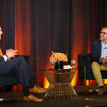 President Chris Eisgruber and alumnus Mason Morfit discuss Princeton on the stage in Los Angeles.