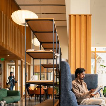 Students read quietly in one of the common spaces of Huo College