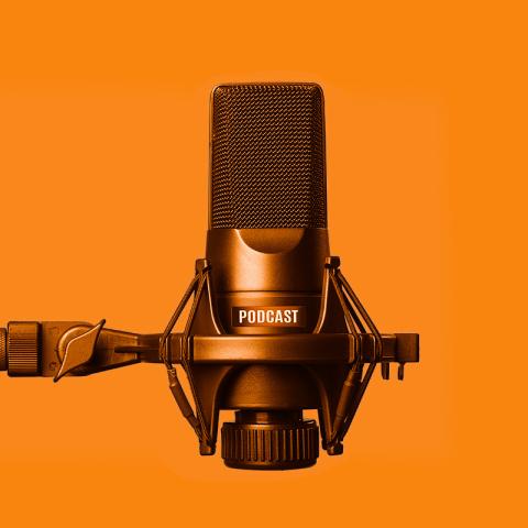 Microphone on orange background
