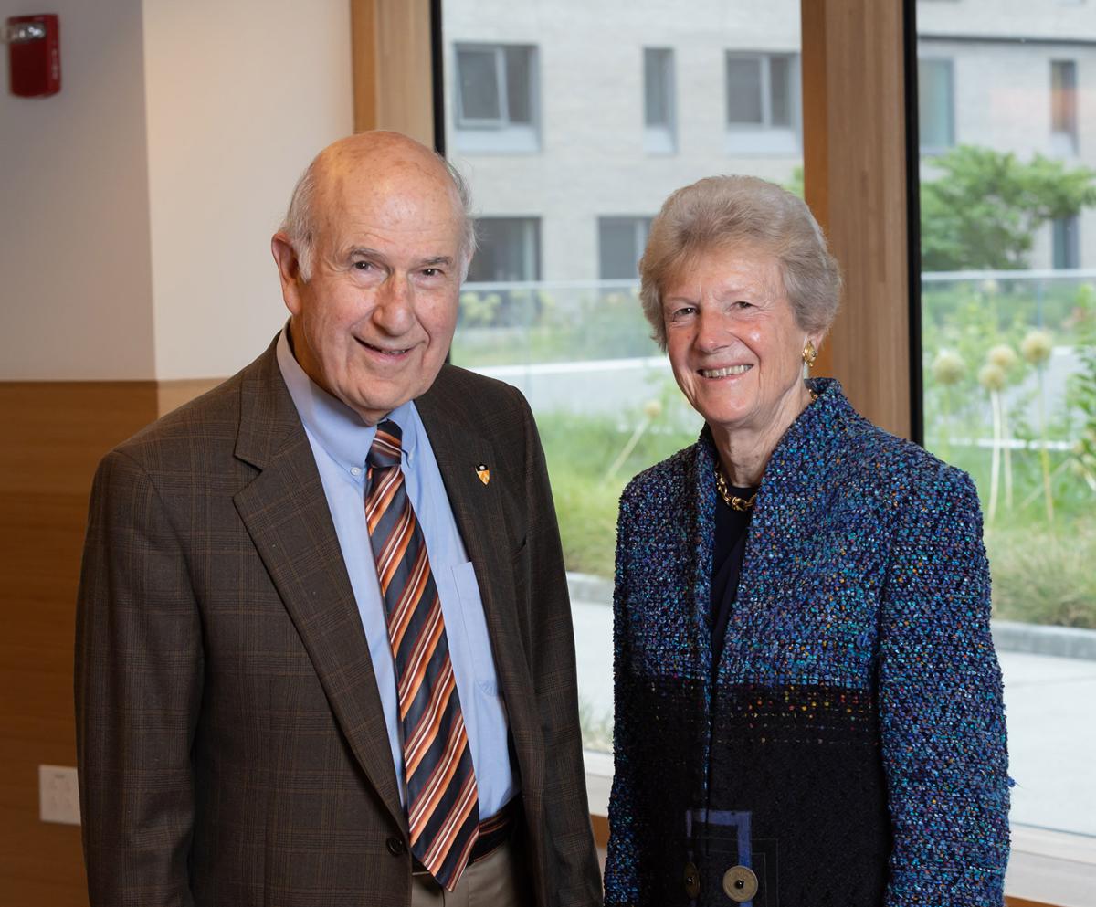 Gil Omenn and Martha Darling, posing for the camera