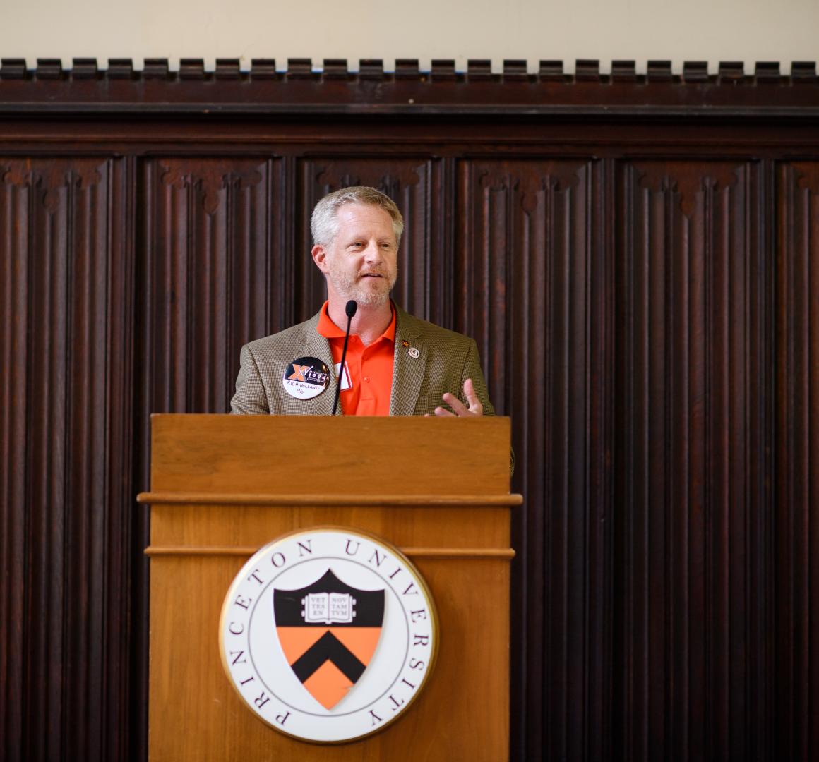 Rich Holland at podium
