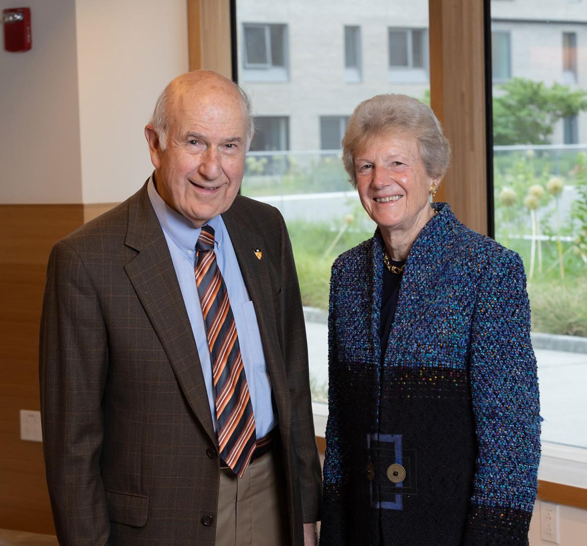 Gil Omenn and Martha Darling, posing for the camera