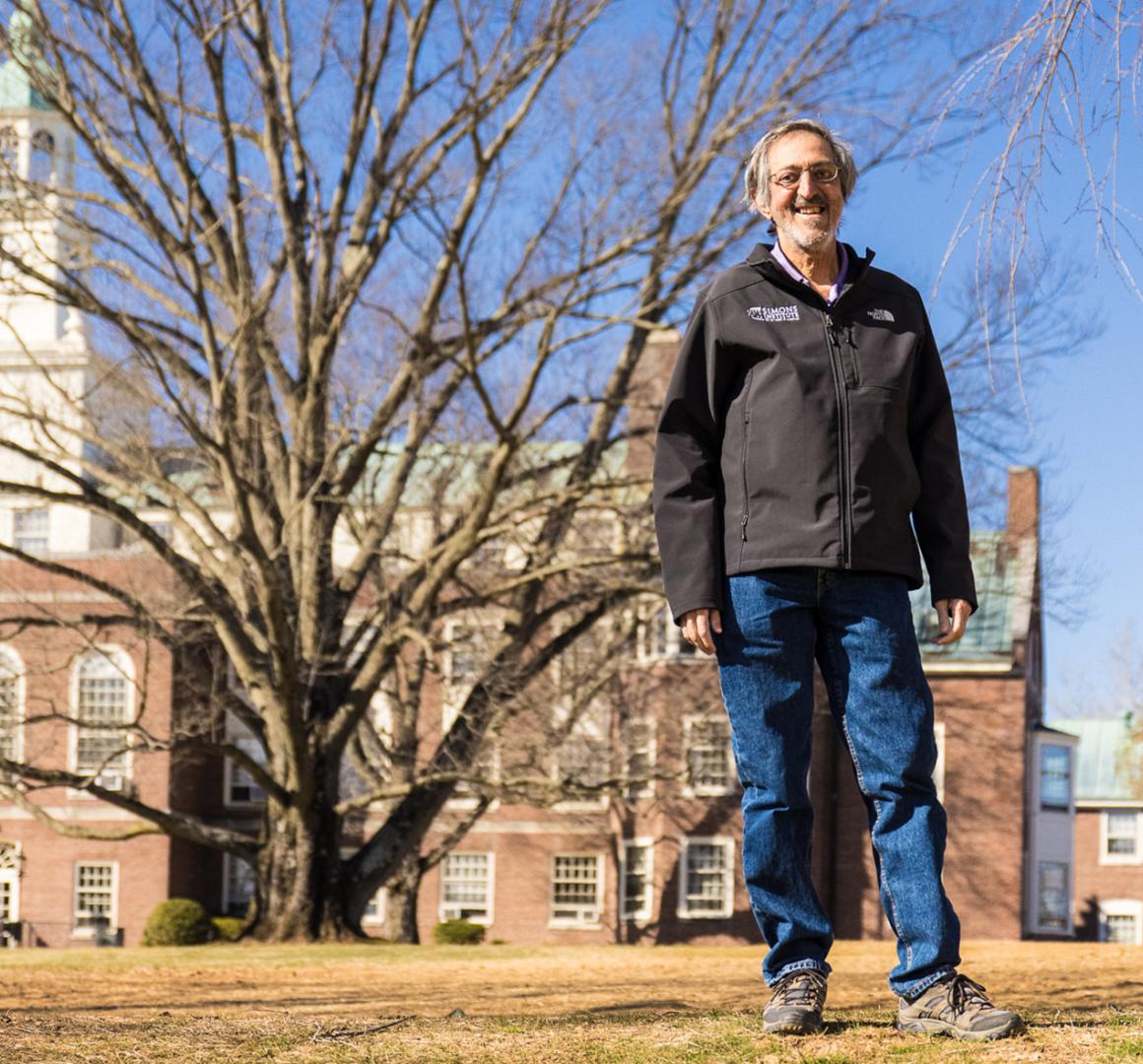 Avi Wigderson, standing near the Institute of Advanced Study