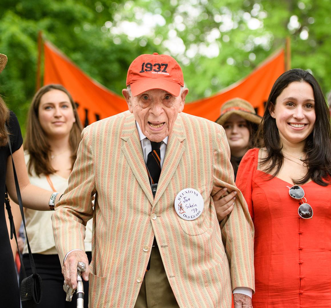 Joe Schein and his granddaughters walk in the 2018 P-rade